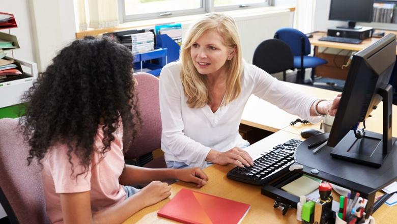 College counselor working with a student